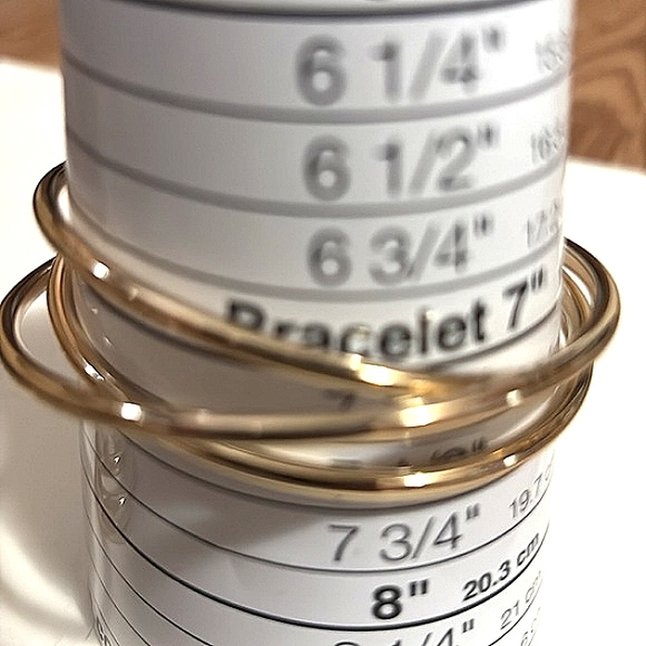 GEOMETRIC GOLD-TONE BRACELET AND MATCHING LEVERBACK EARRINGS SET - Picture 7 of 10